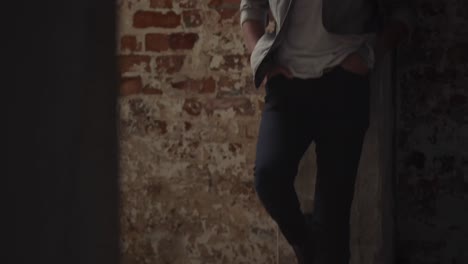 Fashionable-young-man-in-an-abandoned-warehouse