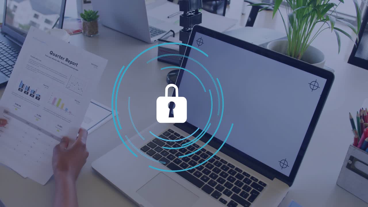 Hands typing laptop generating blue rings and lock hovering screen while studying quarter report