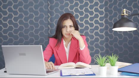 Stressed-young-business-woman-biting-nails.