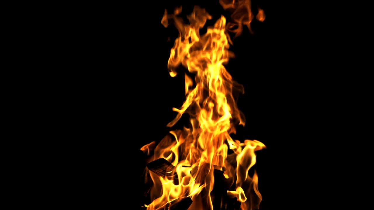 Bonfire in night. Close view. Slow motion. Campfire in the woods.