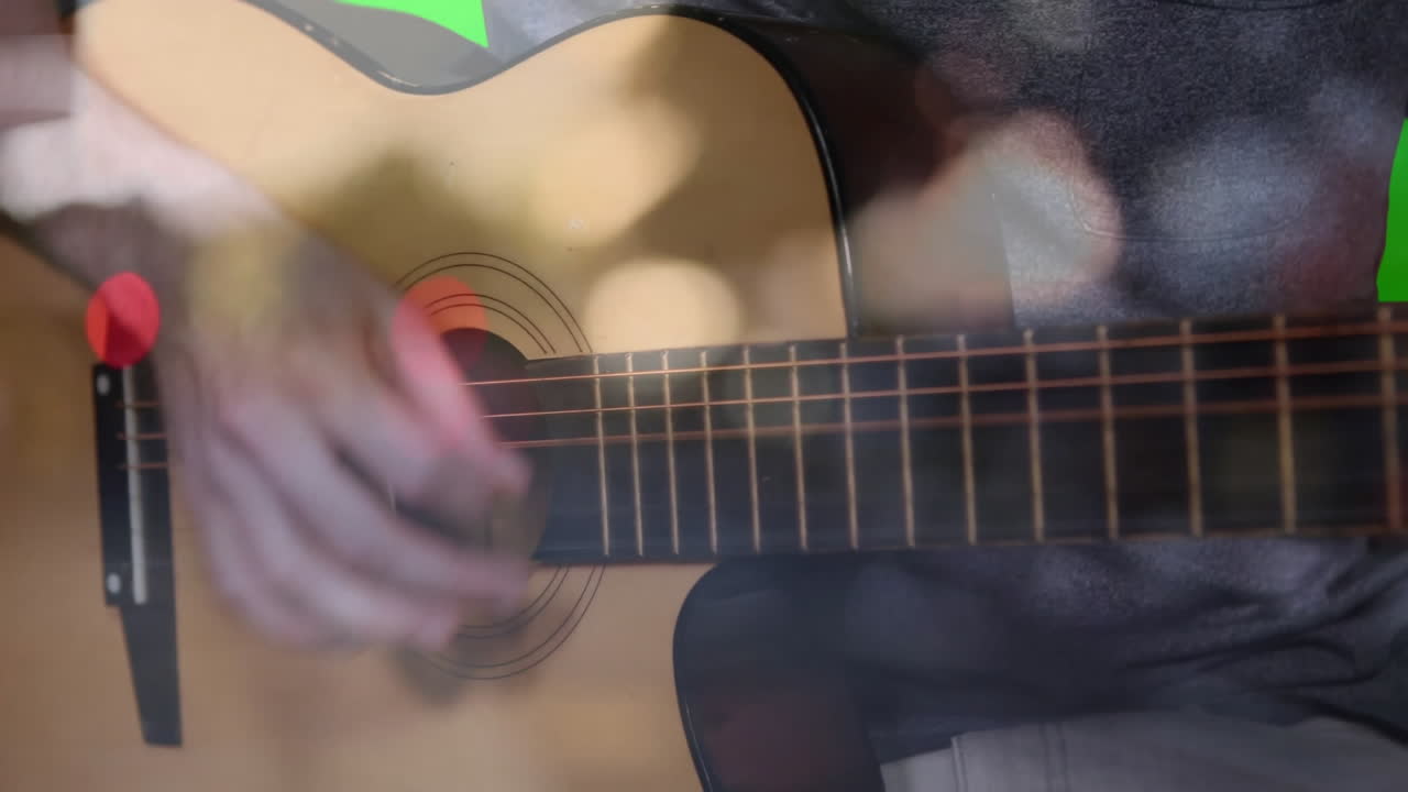 Acoustic guitar performing warm wooden tone in flat design with six steel strings under yellow pick