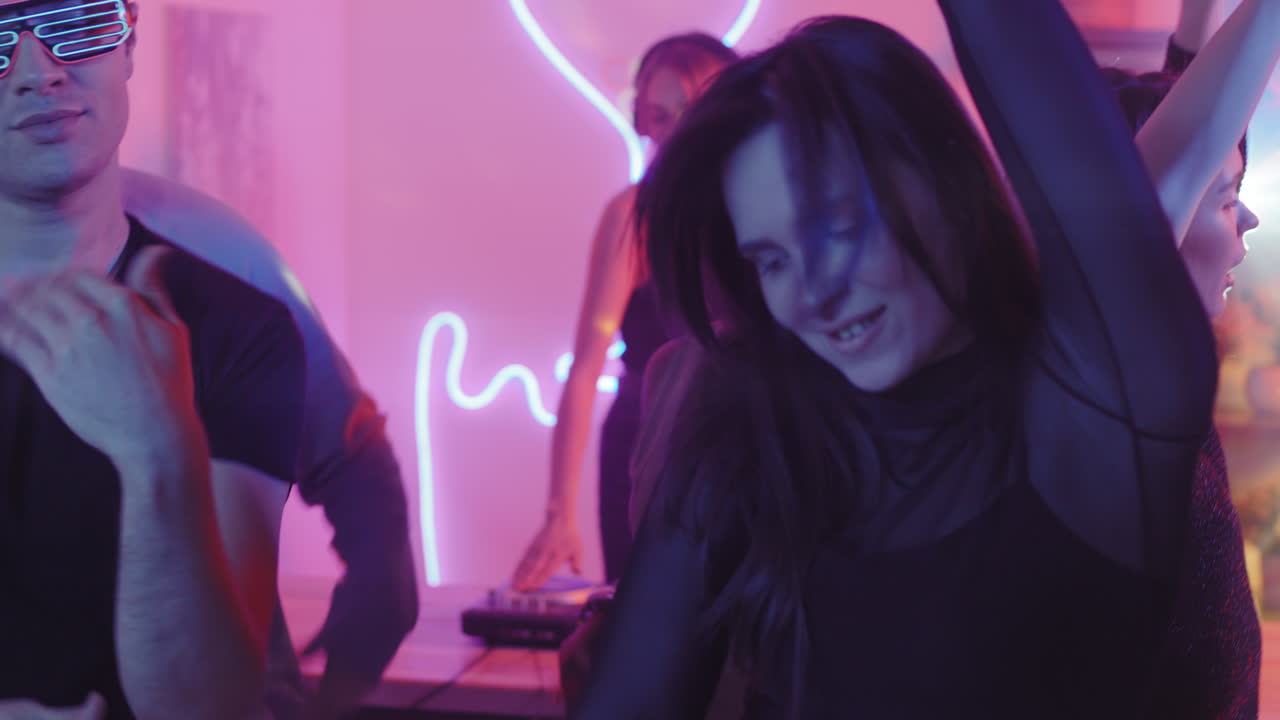 Enthusiastic Woman Dancing at House Party