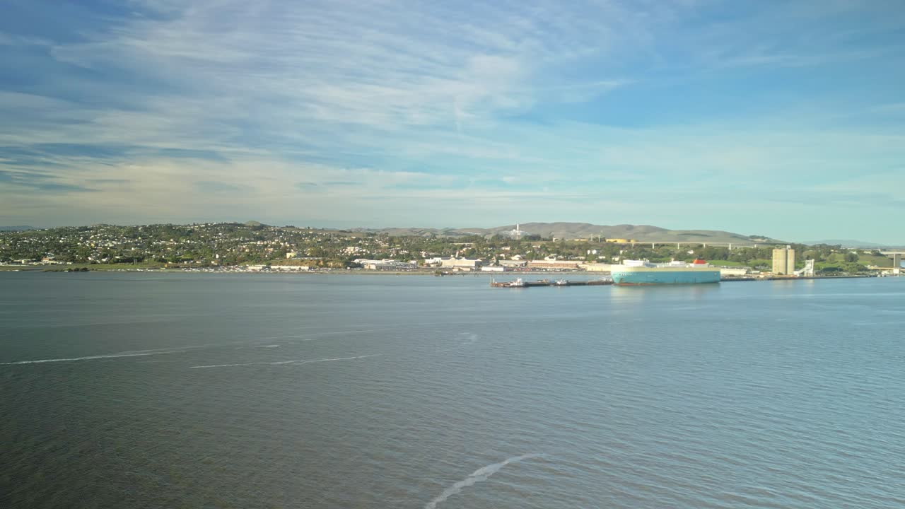 Sweeping drone view of Benicia, California, showcasing its picturesque downtown, historic landmarks, and the vibrant waterfront as the camera smoothly pans across the cityscape.