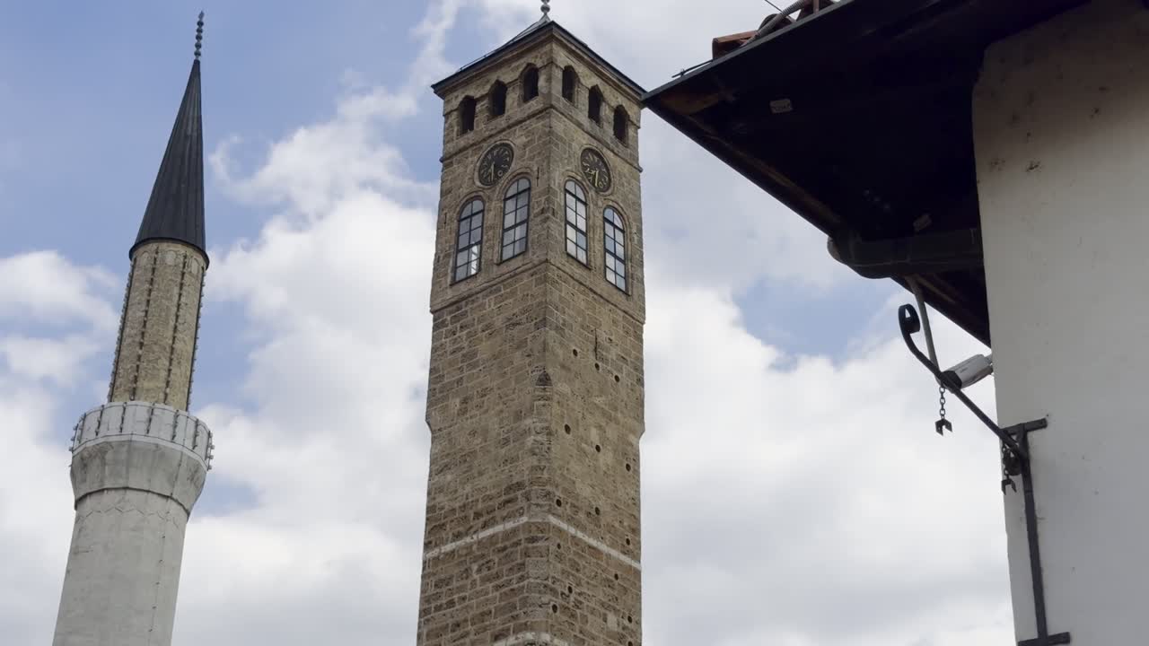 Sarajevo Clock Tower showing special 'Ala turca' time, located bt Gazi Husrev-beg Mosque in Sarajevo Baščaršija - Bosnia and Herzegovina