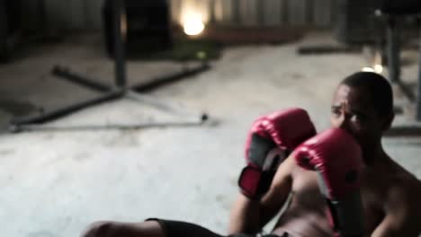 Coach-and-boxer-practicing-boxing-in-the-gym