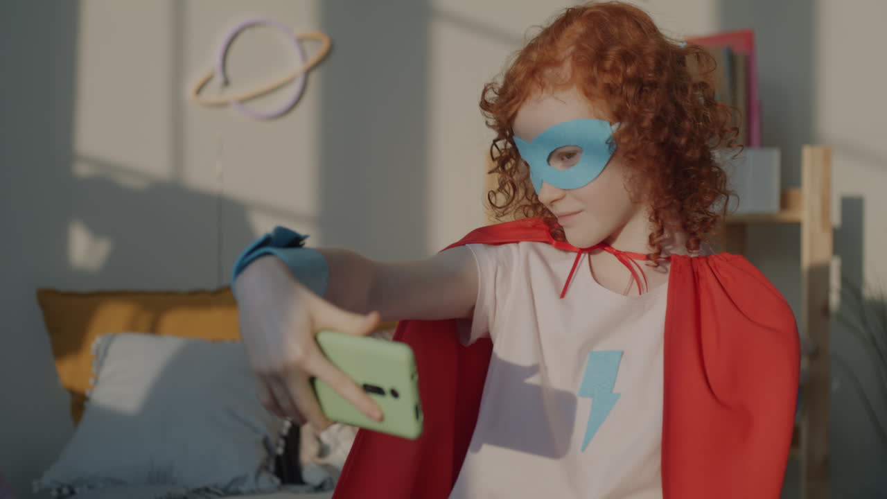 Child Superhero Taking a Selfie