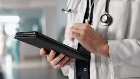 Doctor,-hands-and-tablet-for-hospital-data