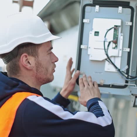 man working at solar power station