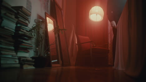 red-lit room with person