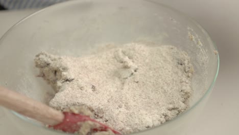 adding wholemeal flour to the dought