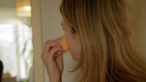 Girl-doing-makeup-at-home