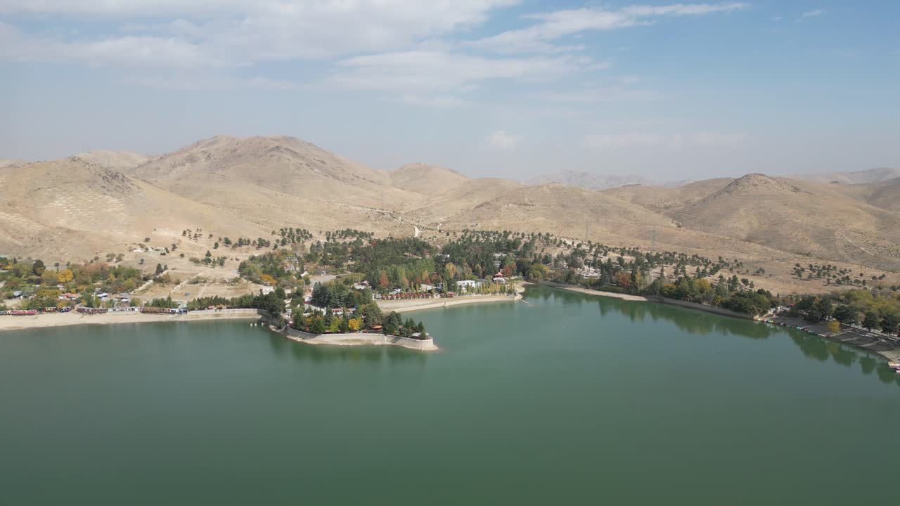 Drone shot over the Qargha Water Reservoir, sunny, fall day in Kabul, Afghanistan