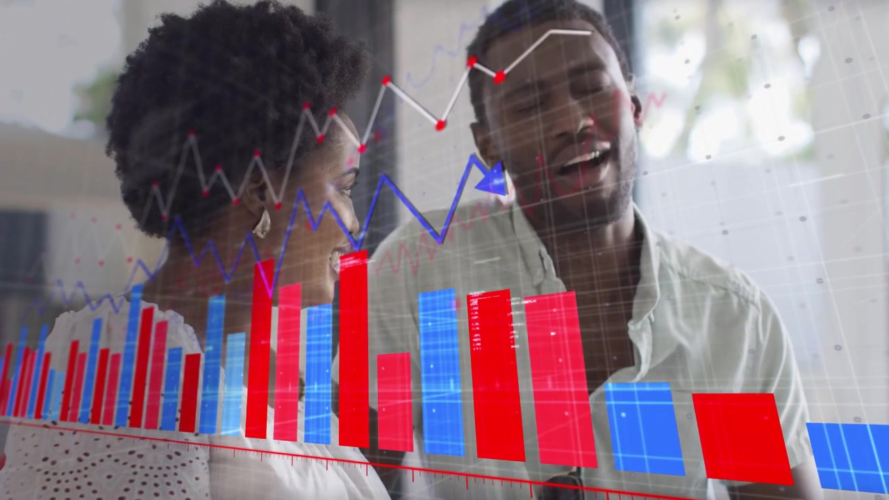 Man pointing at device woman leaning activating animated finance charts rising, celebrating