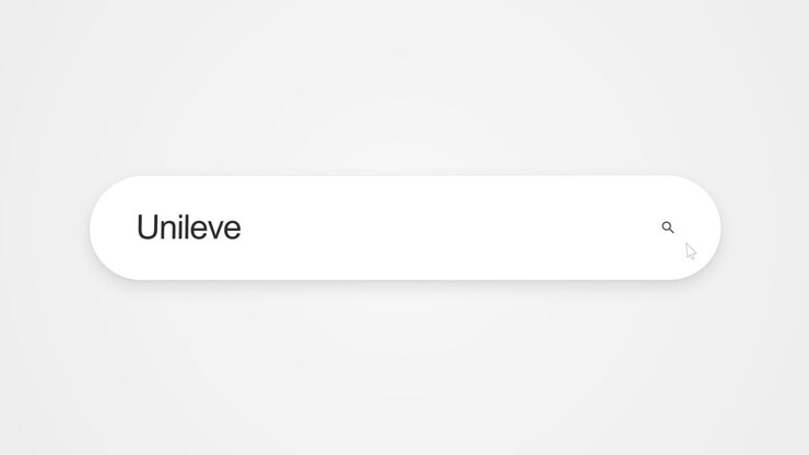 Typing Unilever into a search field, representing online research and web browsing about the global consumer goods company