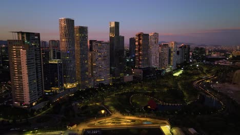 Aerial-view-over-the-Parque-La-Mexicana-around-condominium-in-Santa-Fe,-Mexico