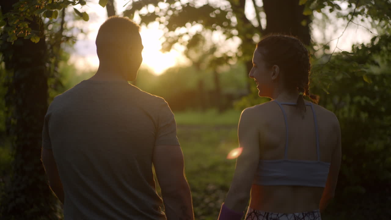 Couple walking during sunset
