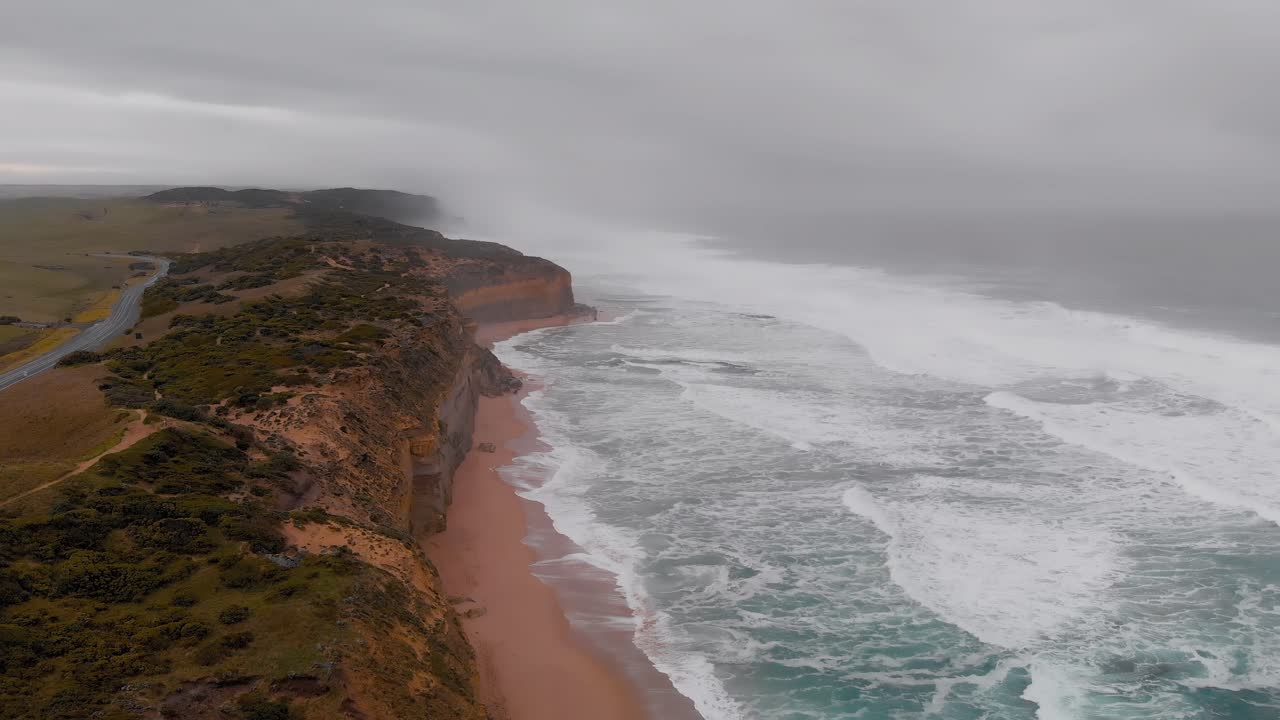 Majestic cliffs and rough ocean aerial view, Twelve Apostles, Australia