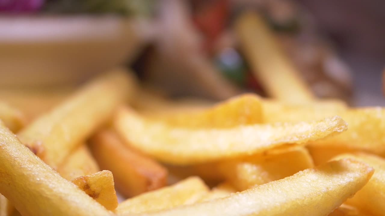 Close-up of Onion Rings and Fries