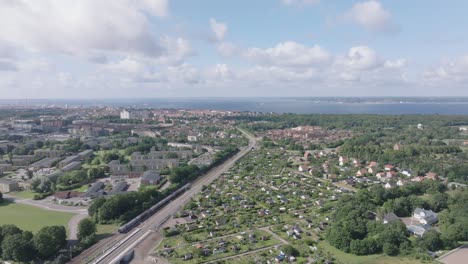 Railway-Tracks-Between-The-City-And-Residential-Areas-Of-Helsingborg,-Sweden