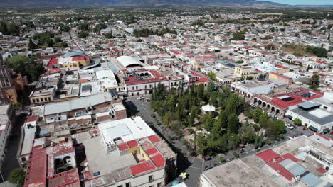 drone performs a semi-orbit capturing the view of rafael paez garden in jerez, zacatecas