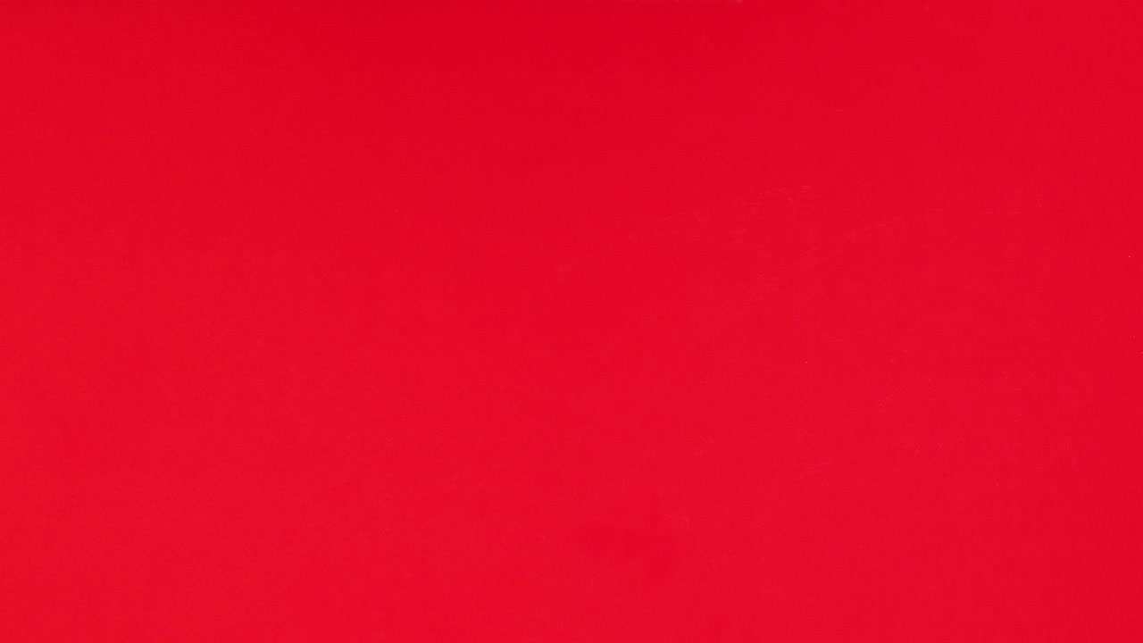 Christmas accessories appear on left and right side on red theme. Stop motion