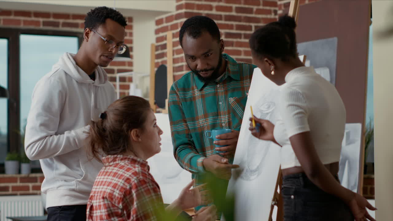 Diverse group of students brainstorming ideas to create vase drawing