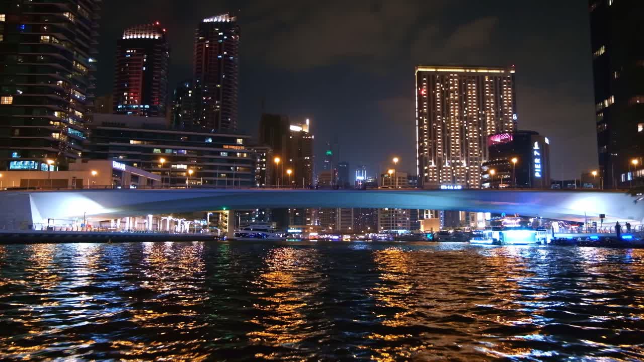 DUBAI, UNITED ARAB EMIRATES-22 FEBRUARY 2019: Scenic shot of the coastline at night near the beautiful buildings