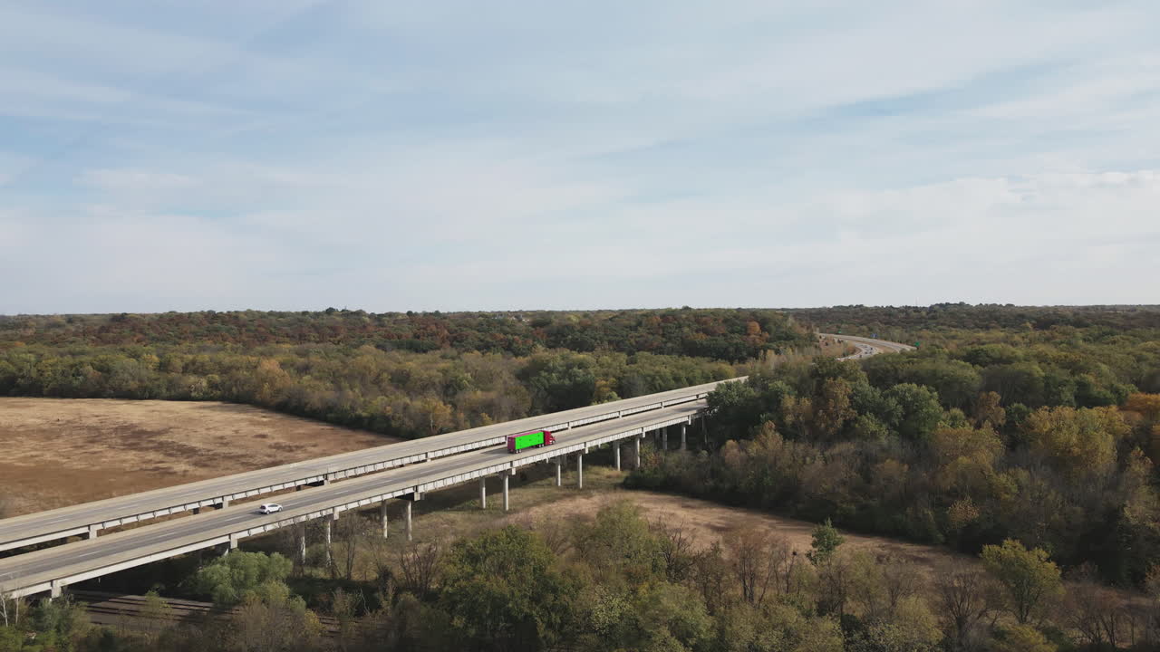 Highway Bridge with Truck Over Fall Foliage