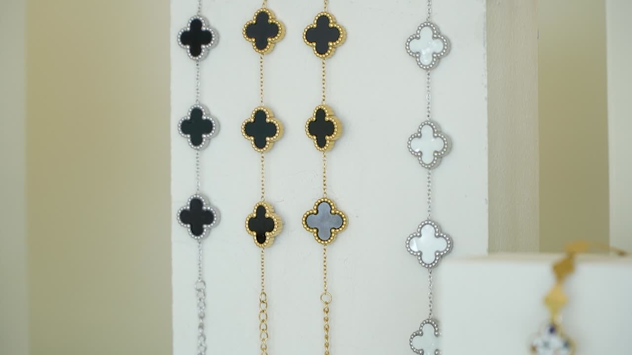 A showcase of stunning jewelry pieces in a boutique setting, highlighting various styles and colors