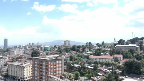 Aerial-view-of-Addis-Abeba-city-center-known-as-Piassa-,-Overlooking-Bole-area-and-surroundings