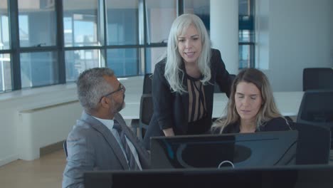 business group watching and discussing presentation