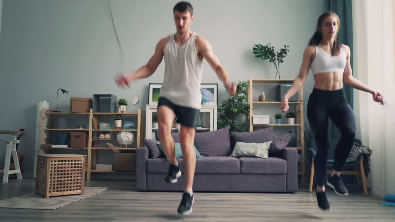 Couple Jumping Rope at Home