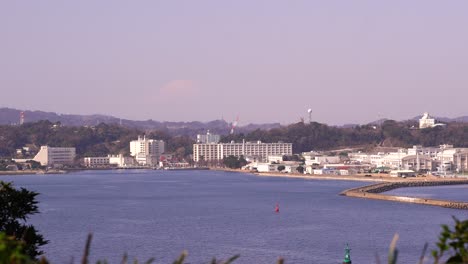 View-out-towards-Japanese-port-town-with-ocean