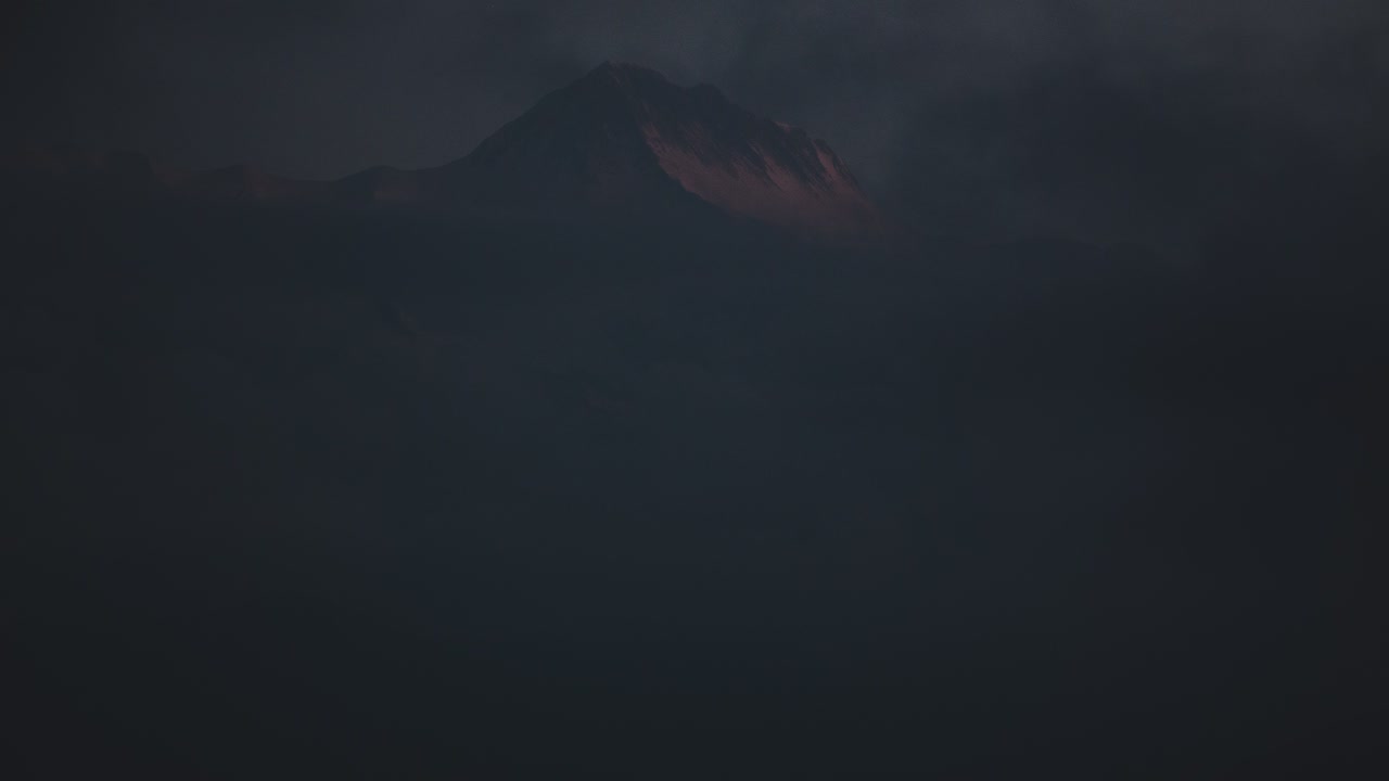 Mountain Peaks Hidden in Clouds