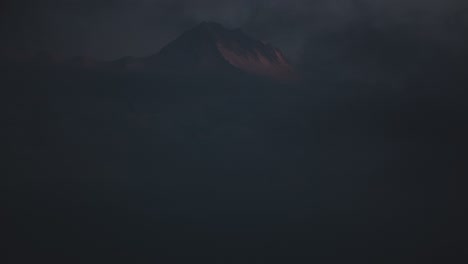 mountain peaks hidden in clouds