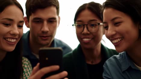 a group of friends engaged in a mobile phone conversation, sharing exciting news and reactions while gathering together, expressing enthusiasm and curiosity.