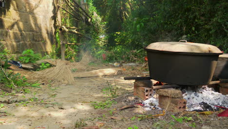 Iron-pot-smoking-on-the-fire-pit