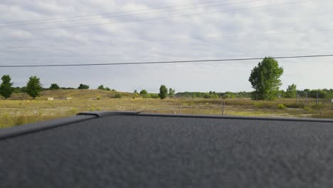 drone taking off from a truck bed at a build site