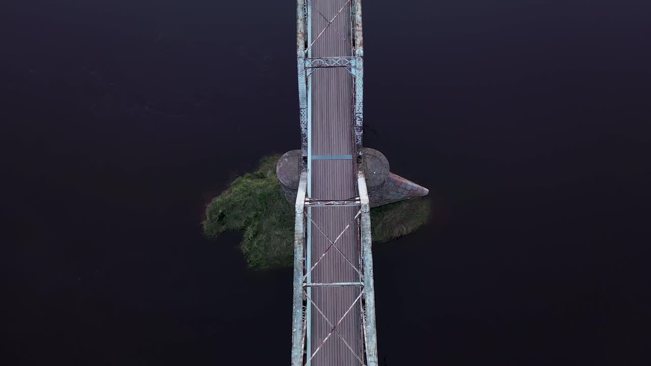The Iron Bridge - Aerial View Of Rusty Truss Bridge Over Gauja River Near Valmiera City In Latvia, Europe