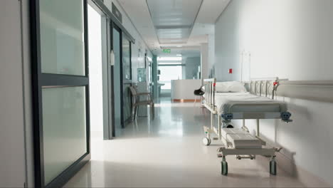 healthcare, hospital and empty hallway with bed