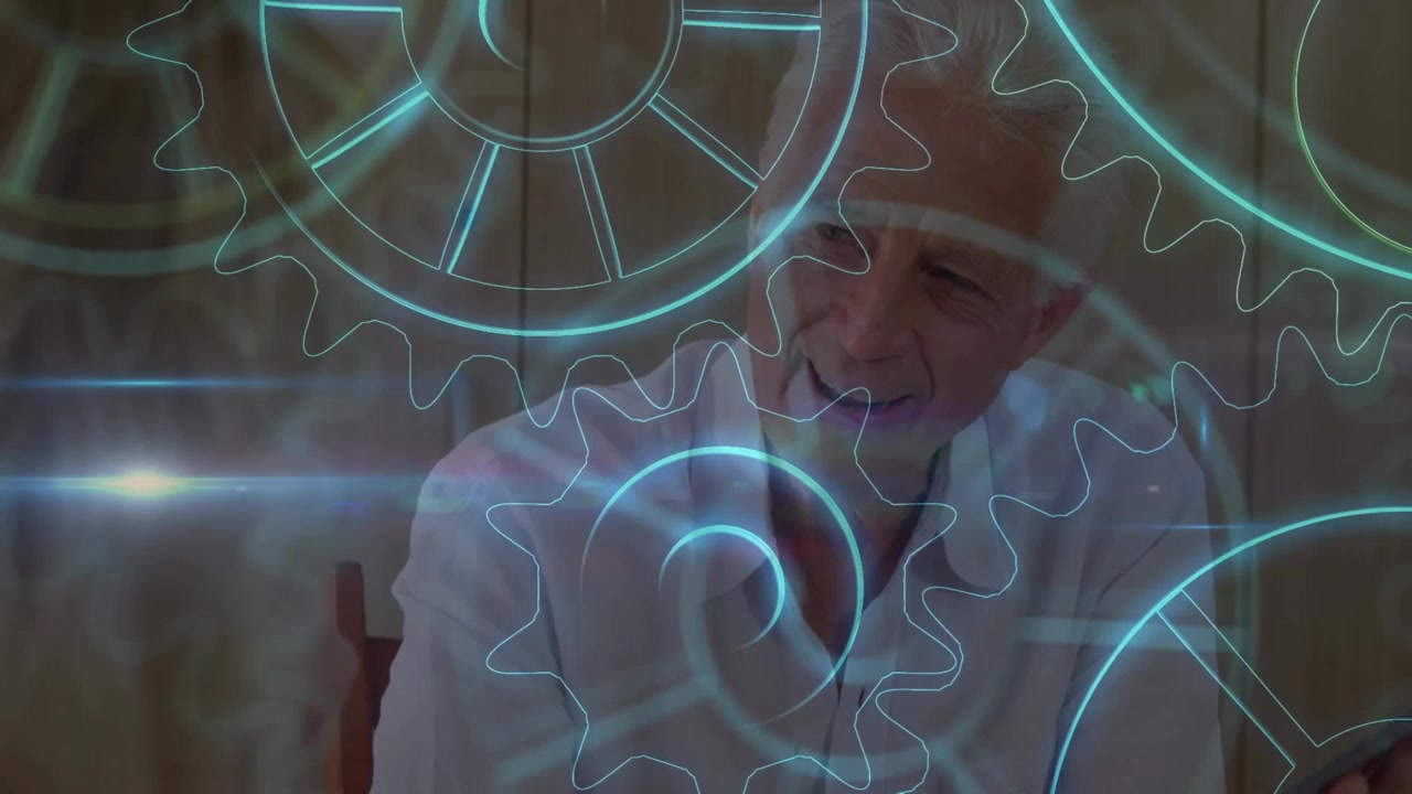 Animation of cogs over caucasian male doctor and patient