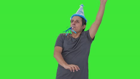 Happy-Indian-man-dancing-in-birthday-cap-Green-screen