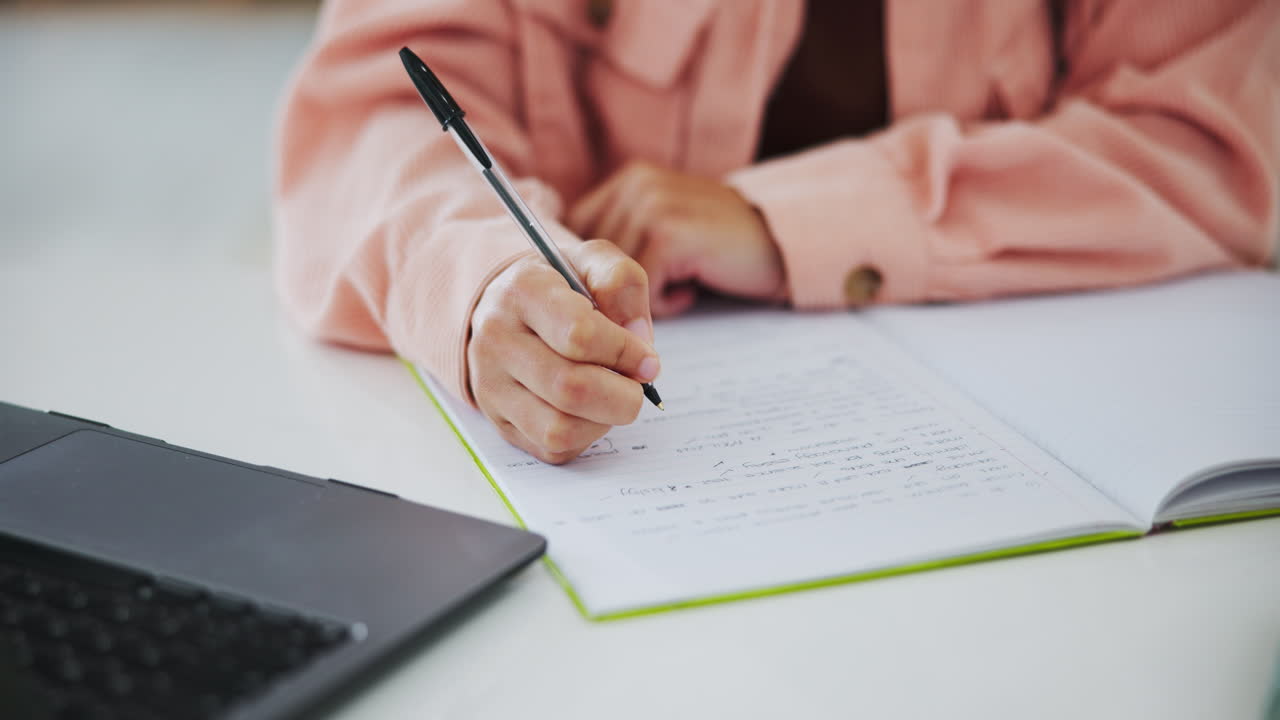 A student is taking notes