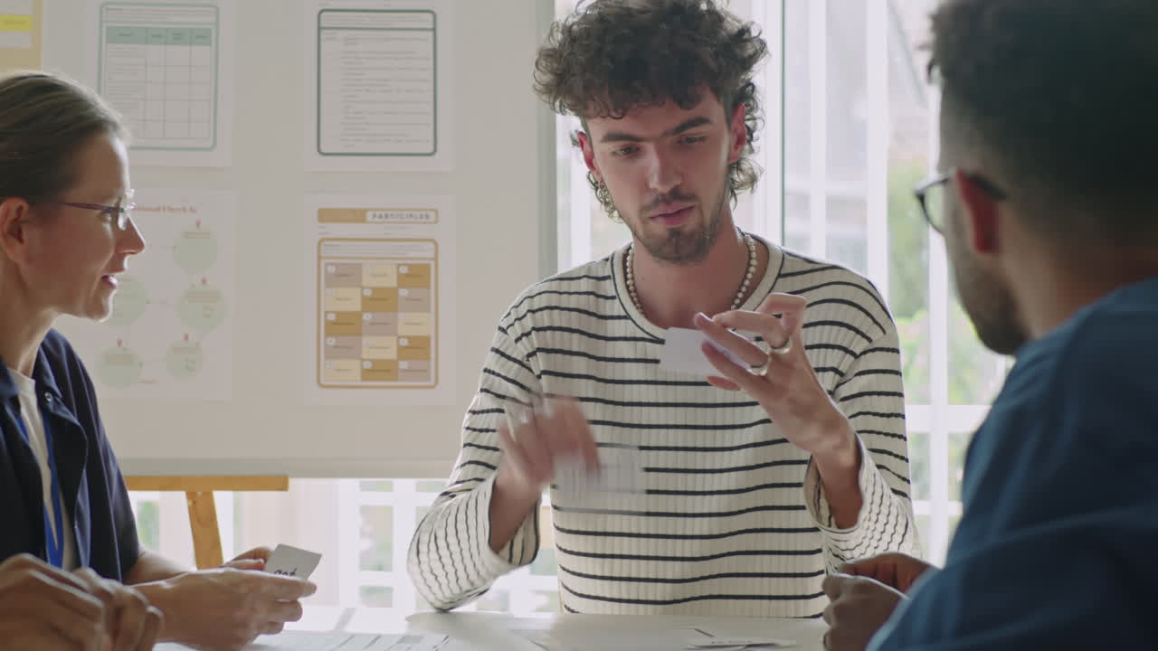 Young Male Student Learning New English Words on Cards on Lesson