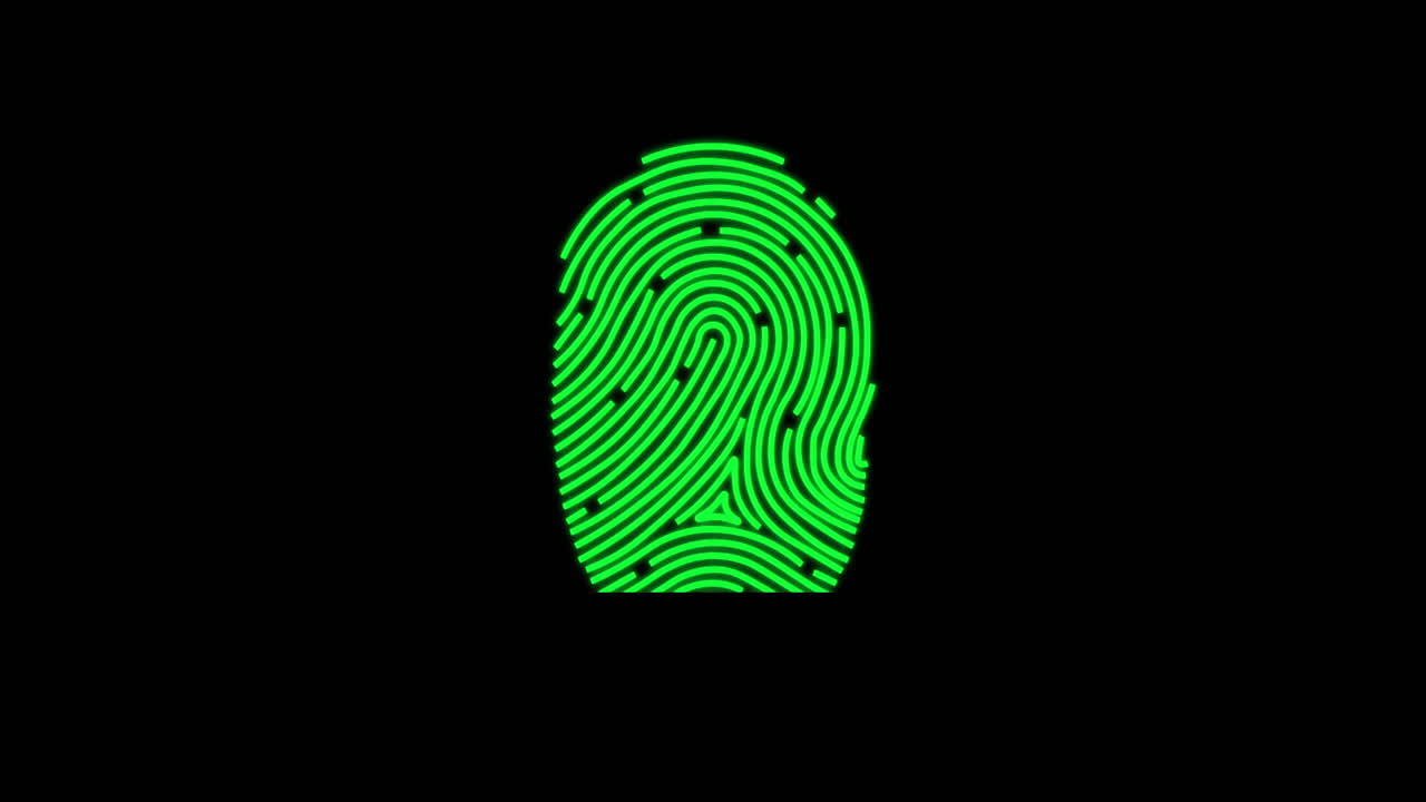 Red and green fingerprint scanner against black background