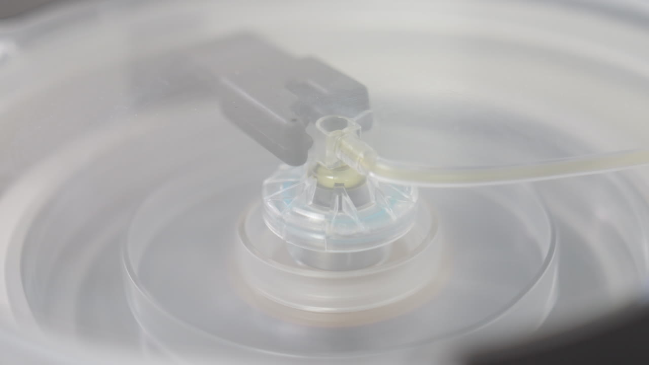 Centrifuge machine spinning quickly. Close up. Device separating plasma from blood. PRP therapy.