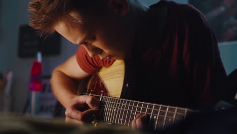 Teenager Playing Acoustic Guitar