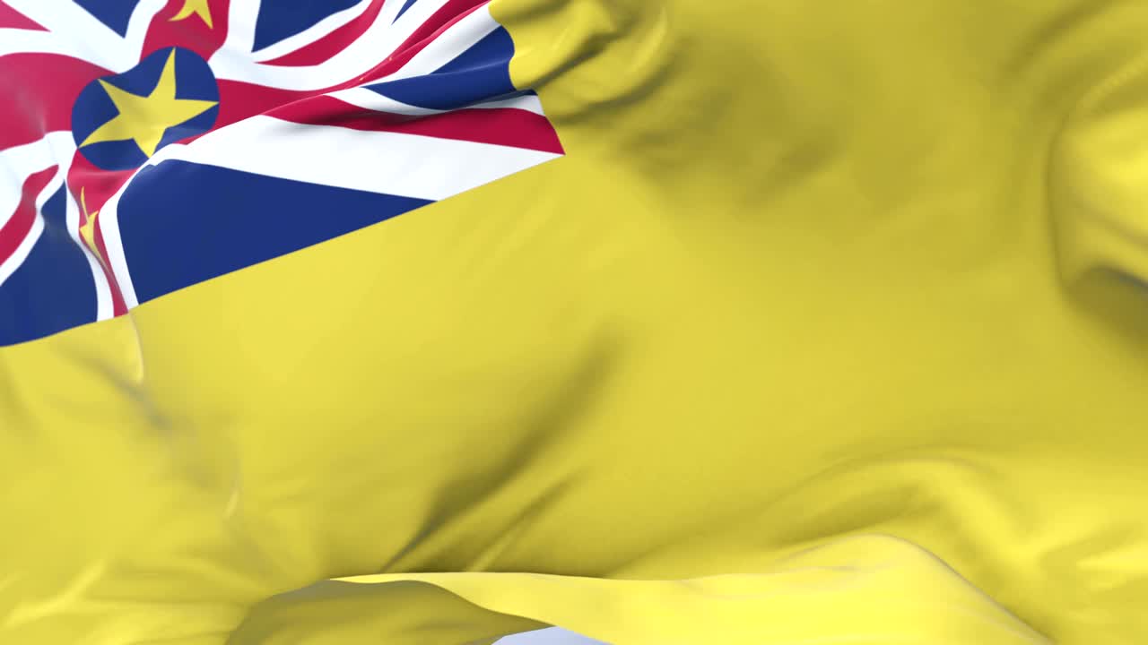 bandera de niue agitando al viento en lento en el cielo azul, bucle