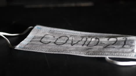 mask with text covid-19, protection against corona virus outbreak, close up