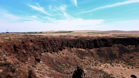 flying up and over frenchman's coulee revealing a panoramic columbia river gorge, areial